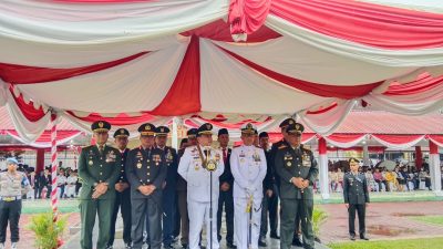 Pj Gubernur Sultra, Andap Budhi Revianto saat menghadiri HUT Bhayangkara ke-78 bertempat di Polda Sultra.
