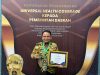Pj Gubernur Sultra, Andap Budhi Revianto, usai menerima penghargaan Universal Health Coverage (UHC) kategori Utama.