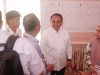 Pj Gubernur Sultra, Andap Budhi Revianto saat meninjau proses pemungutan dan penghitungan suara di Kabupaten Konawe dan Kota Kendari.