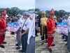 Gubernur Sultra Andi Sumangerukka saat menyerahkan bantuan beasiswa kepada pelajar tingkat SMA/SMK dan SLB di Kabupaten Kolaka serta penyerahan secara simbolis berupa seragam gratis untuk OSIS SMA dan SMK.