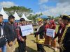 Pemkab Mubar saat menyerahkan santunan JKM kepada 10 ahli waris pekerja rentan. (Dok. Istimewa) 